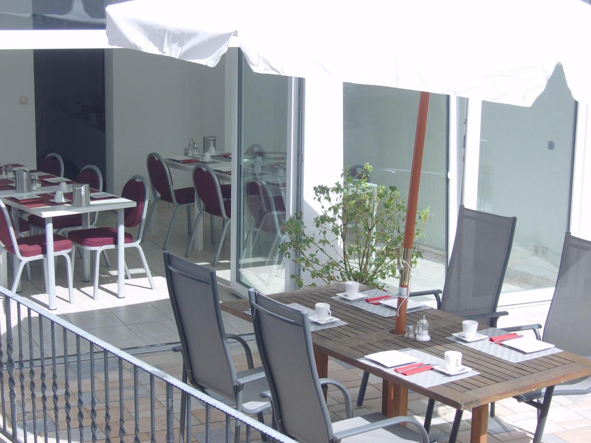 Zum Loewen Hotel บาดฮอมบูร์ก ฟอร์ แดร์เฮอเฮอ ภายนอก รูปภาพ